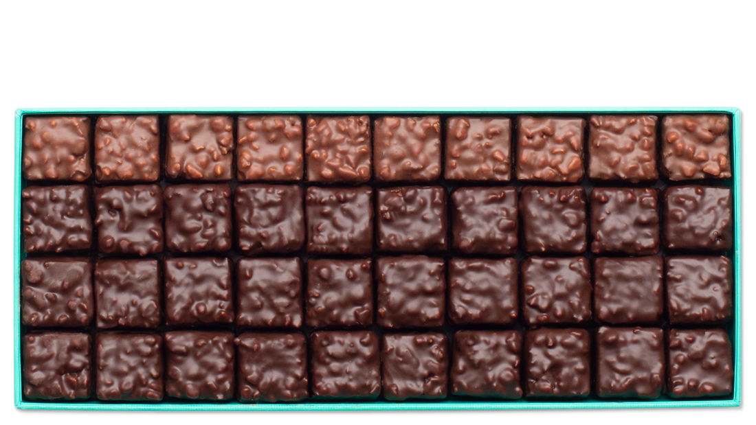 Chocolate specialities with pralines, almonds and raw Chocolate specialities with pralines, almonds and raw