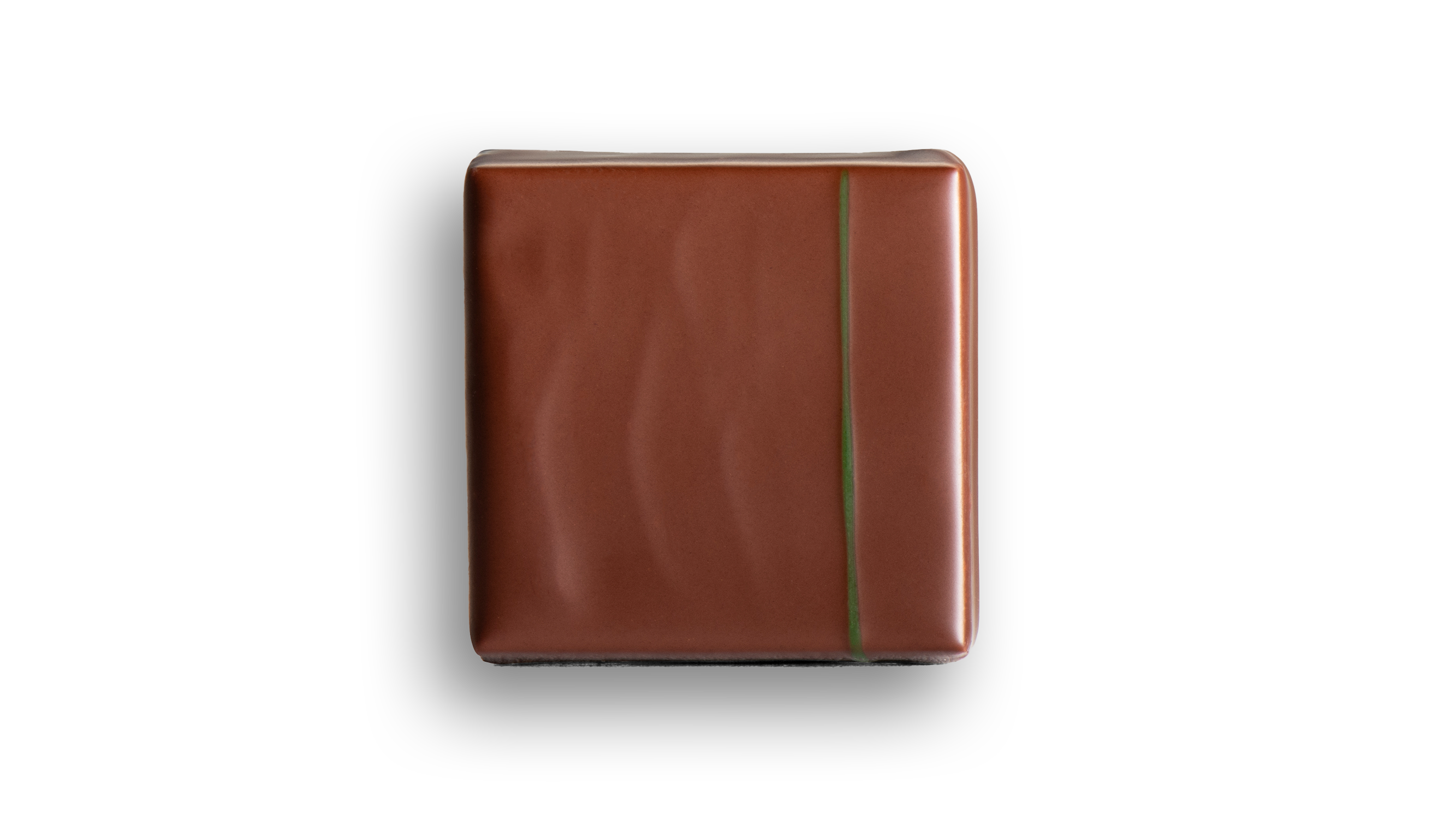 Ganache chocolat nature 66% Vanuatu, onctueuse et fondante aux notes d’épices grillées et fruits séchés. 